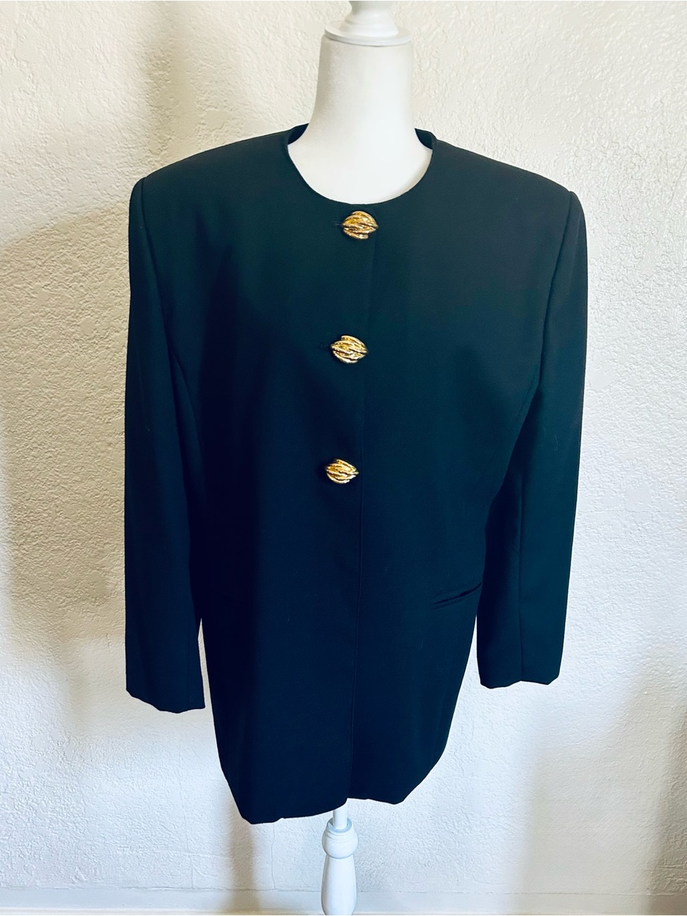 Women's black wool dress coat.